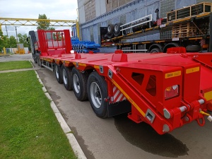 Высокорамный полуприцеп-тяжеловоз Политранс 94165-040