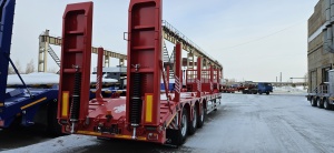 Высокорамный полуприцеп-тяжеловоз Политранс 94163-050