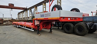 Низкорамный полуприцеп-тяжеловоз 94183-010