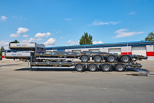 Низкорамный полуприцеп-тяжеловоз Политранс 94184-010