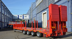 Низкорамный полуприцеп-тяжеловоз Политранс 94184-010