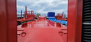 Среднерамный полуприцеп-тяжеловоз Политранс 94163-031