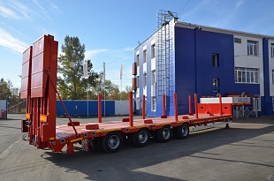 Низкорамный полуприцеп-тяжеловоз Политранс 94184-010