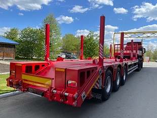 Высокорамный полуприцеп-тяжеловоз Политранс 94163-050