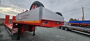 Низкорамный полуприцеп-тяжеловоз 94183-010