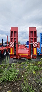 Среднерамный полуприцеп-тяжеловоз Политранс 94163-031