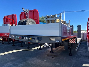 Низкорамный полуприцеп-тяжеловоз 94183-010