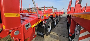 Среднерамный полуприцеп-тяжеловоз Политранс 94163-031